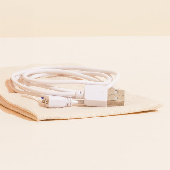 chargeur dune blanc, sur rangement